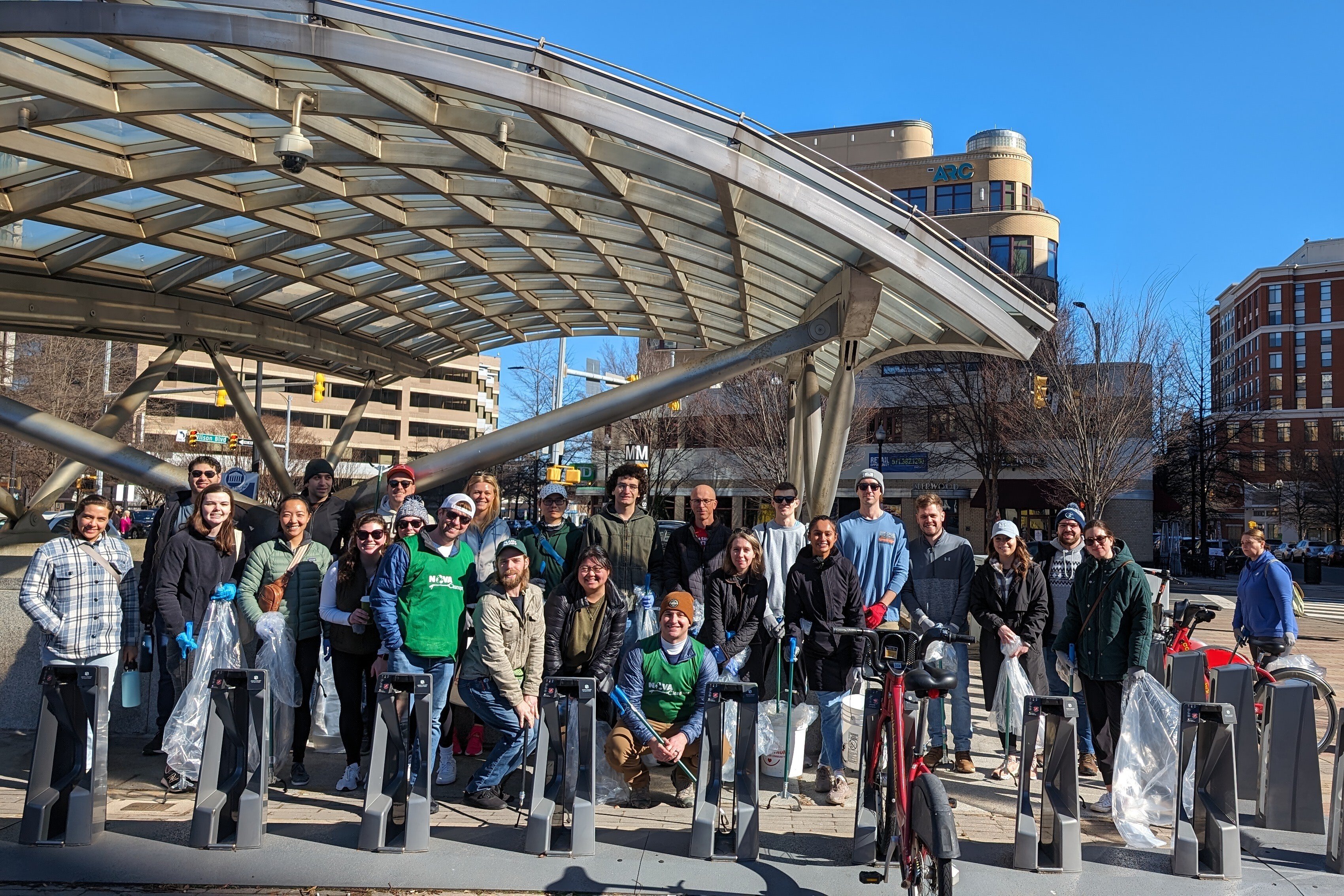 Volunteers in front of Clarendon metro stop ready for a NOVA Cleanups event