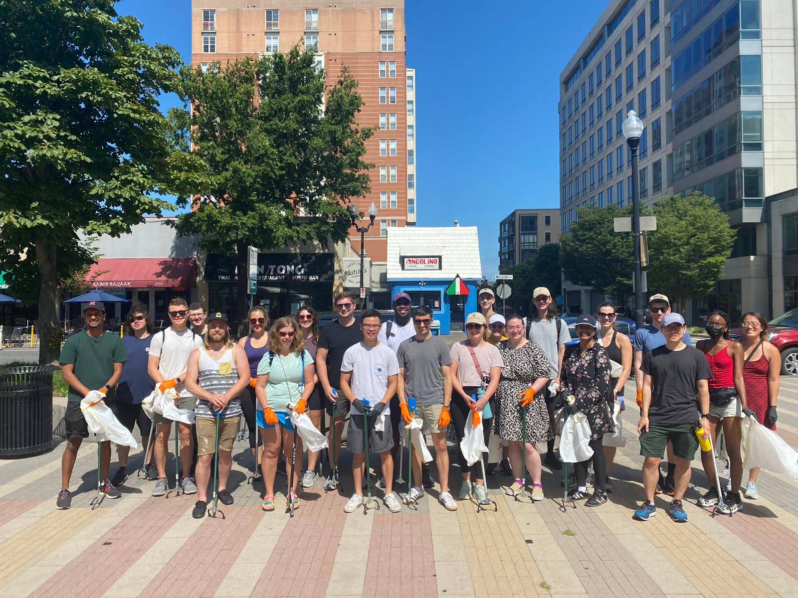 A group of volunteers in Clarendon ready to clean up the neighborhood
