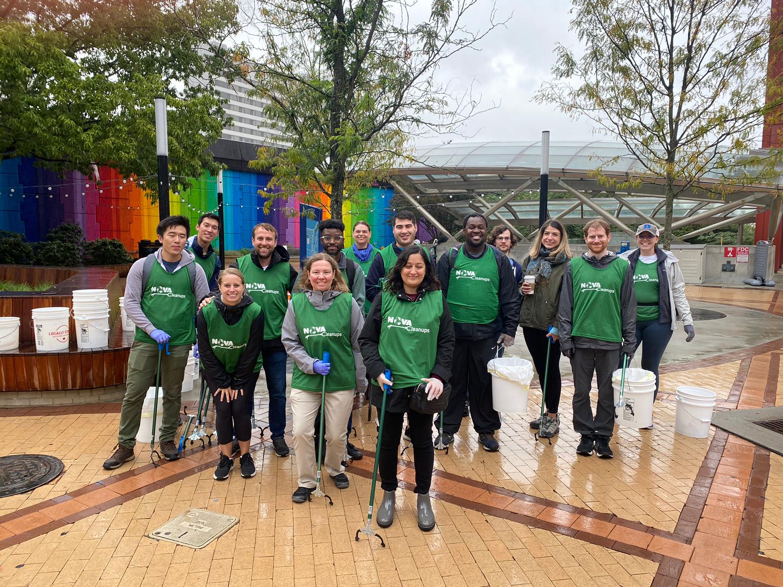 Volunteers in Crystal City by the metro stop ready to clean up the neighborhood